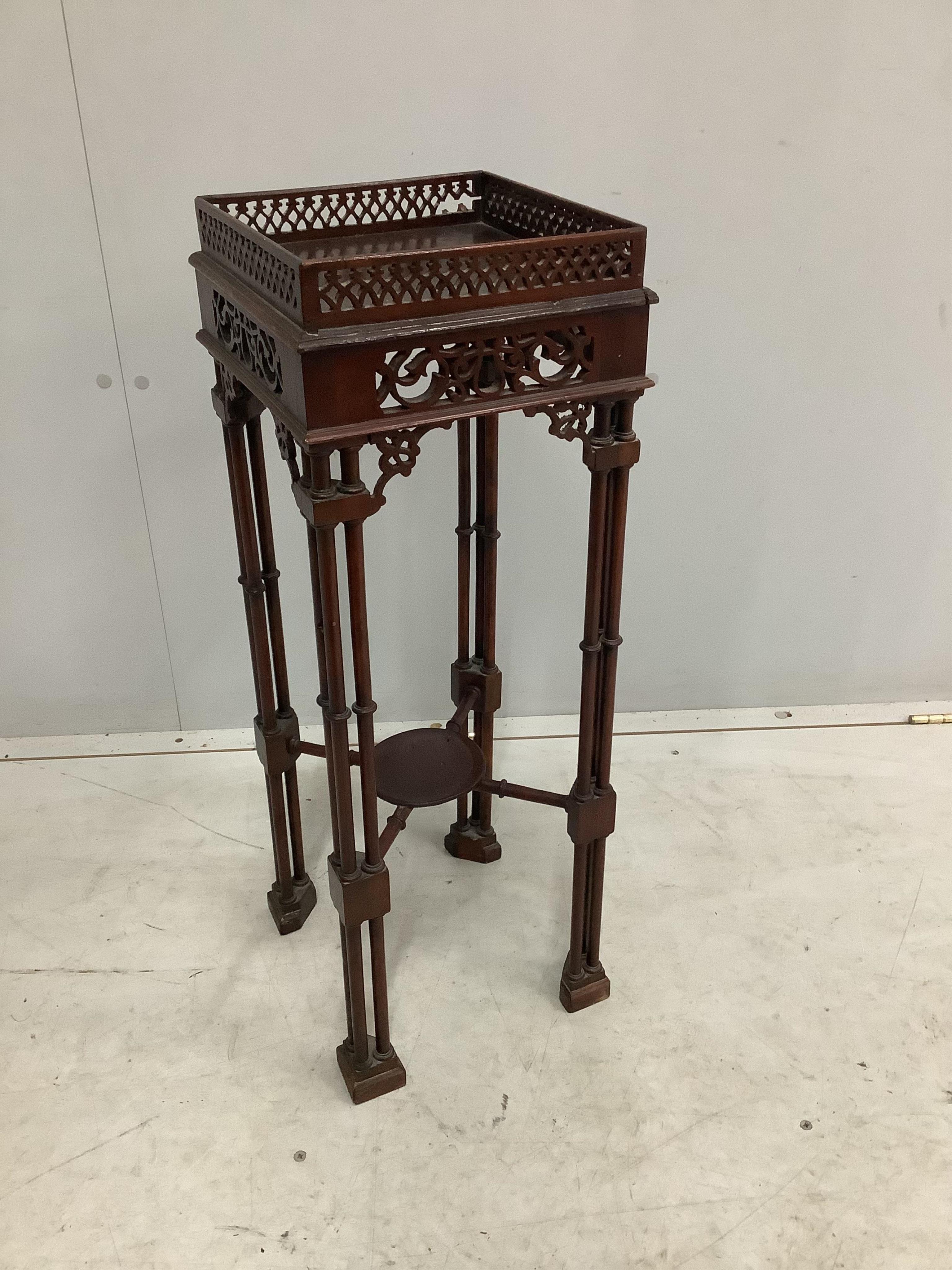 A Chippendale revival mahogany occasional table, width 25cm, height 72cm. Condition - poor to fair, damage to blind fret